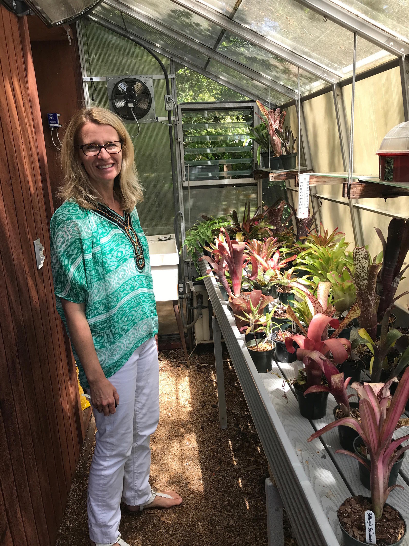Allison Bowden shows off the greenhouse she and her students used to propagate succulents.
