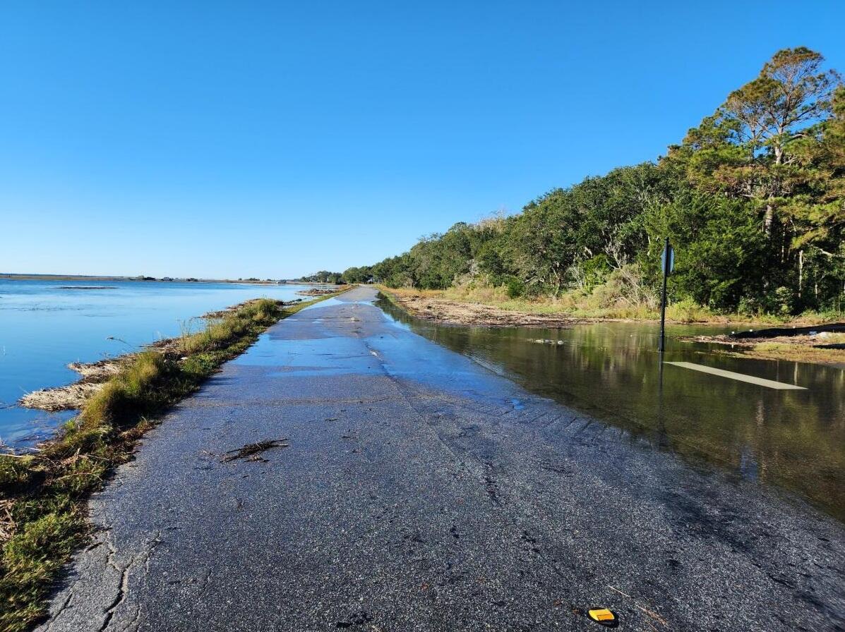 Road flooding is common in the Ten Mile Community during storms and high tides.